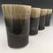 Set of 4 tumblers in matte black and honey luster