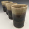 Set of 4 tumblers in matte black and honey luster